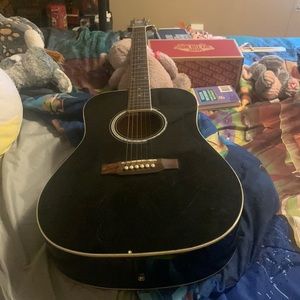 “The old hickory” guitar. It’s in decent condition.